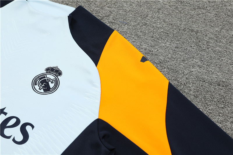 Real Madrid Orange Tracksuit 2024/25 - Player Version