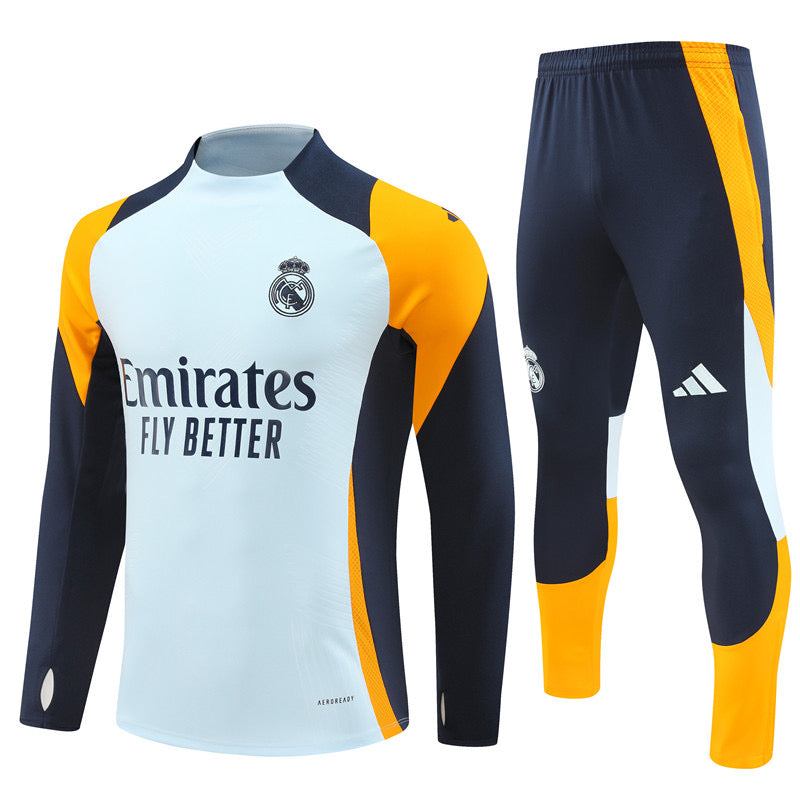 Real Madrid Orange Tracksuit 2024/25 - Player Version