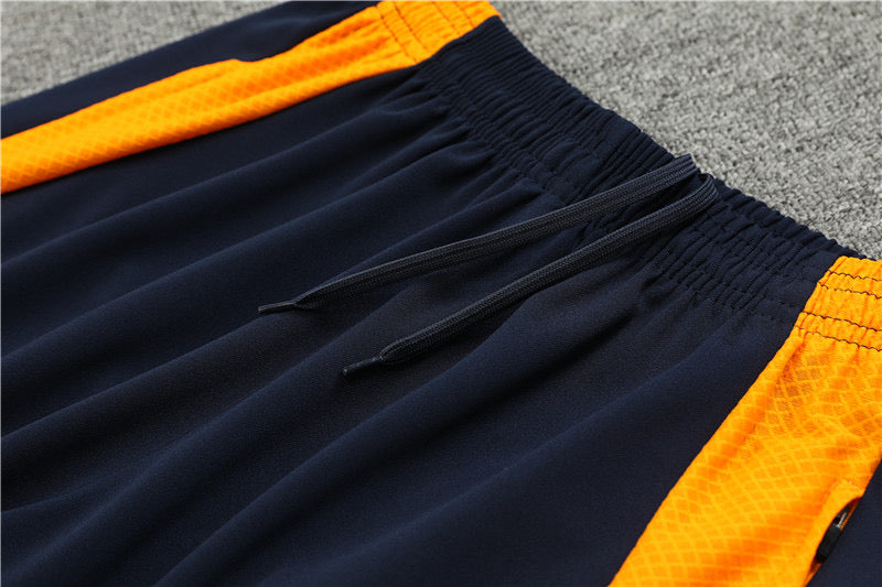 Real Madrid Orange Tracksuit 2024/25 - Player Version