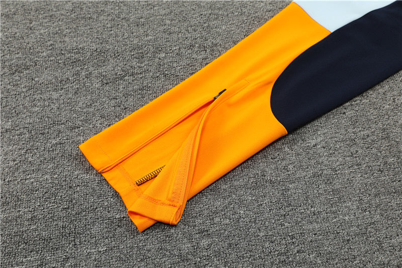 Real Madrid Orange Tracksuit 2024/25 - Player Version