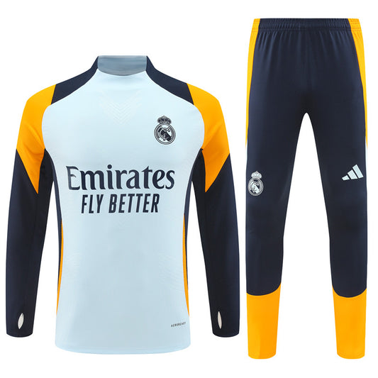 Real Madrid Orange Tracksuit 2024/25 - Player Version
